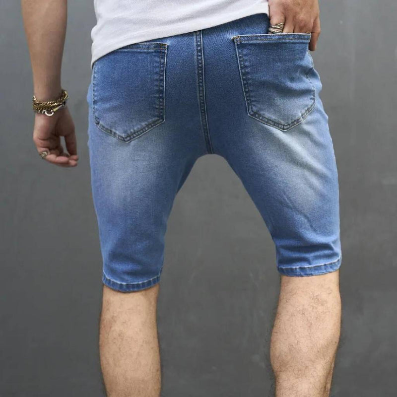 Bermuda Jeans Masculina com Rasgos Desfiados
